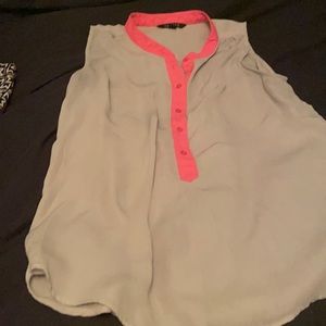 Beautiful sleeveless blouse with a pop of pink